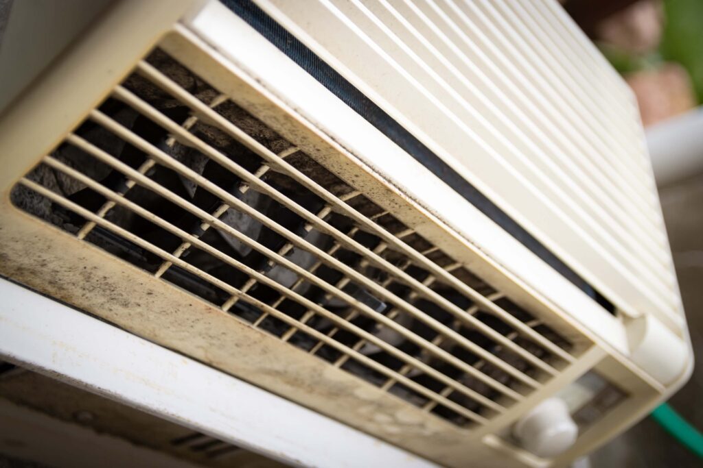 Air conditioning unit with black mold